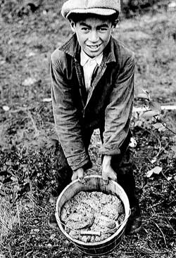 Kid with bucket of caviar